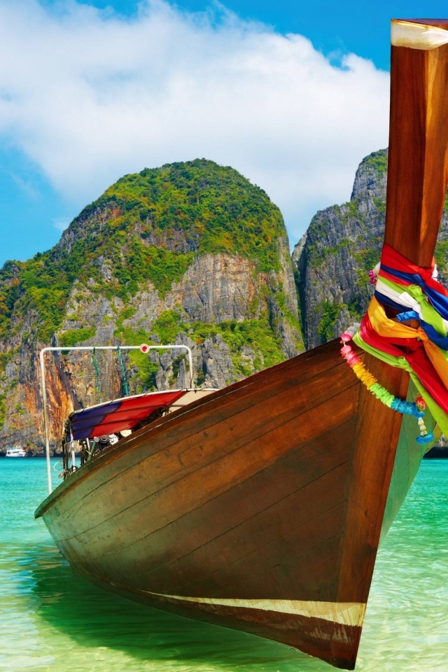 Wooden Boat On Beach