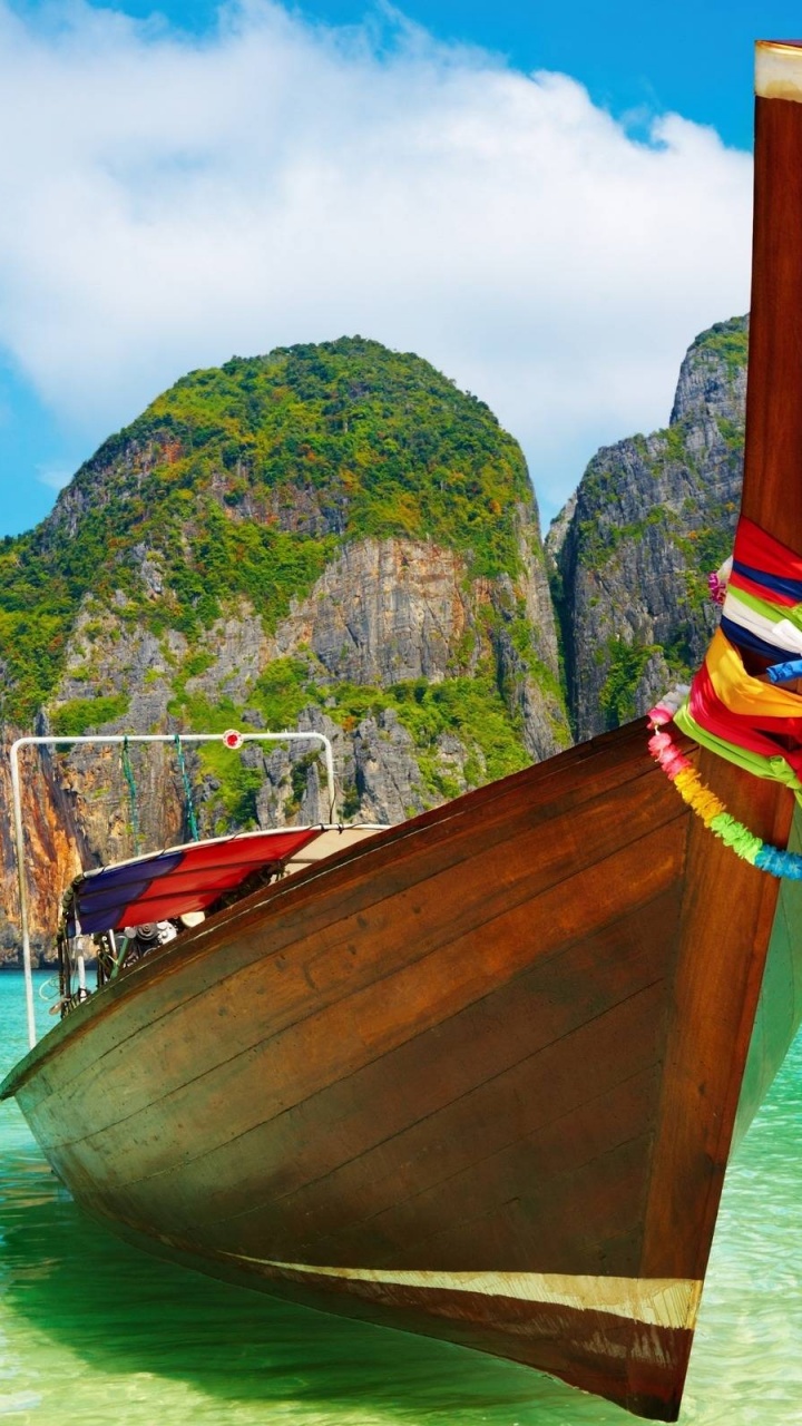 Wooden Boat On Beach